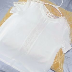 Forever 21 white short sleeve shirt with lace details.